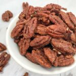 Spiced pecans in a serving bowl