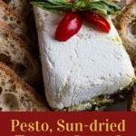 Cream cheese, layered with sun-dried tomatoes and peston with bread slices