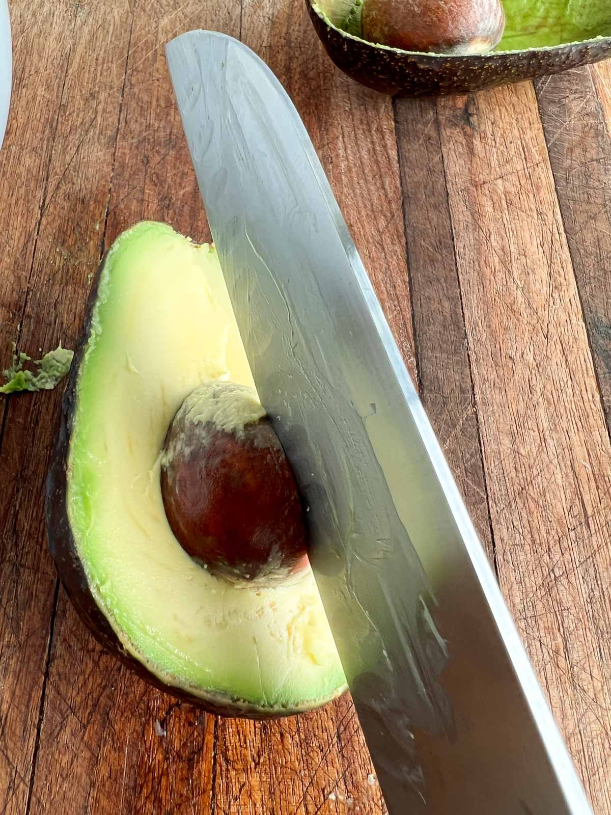 Knife removing pit from the pit from an avocado