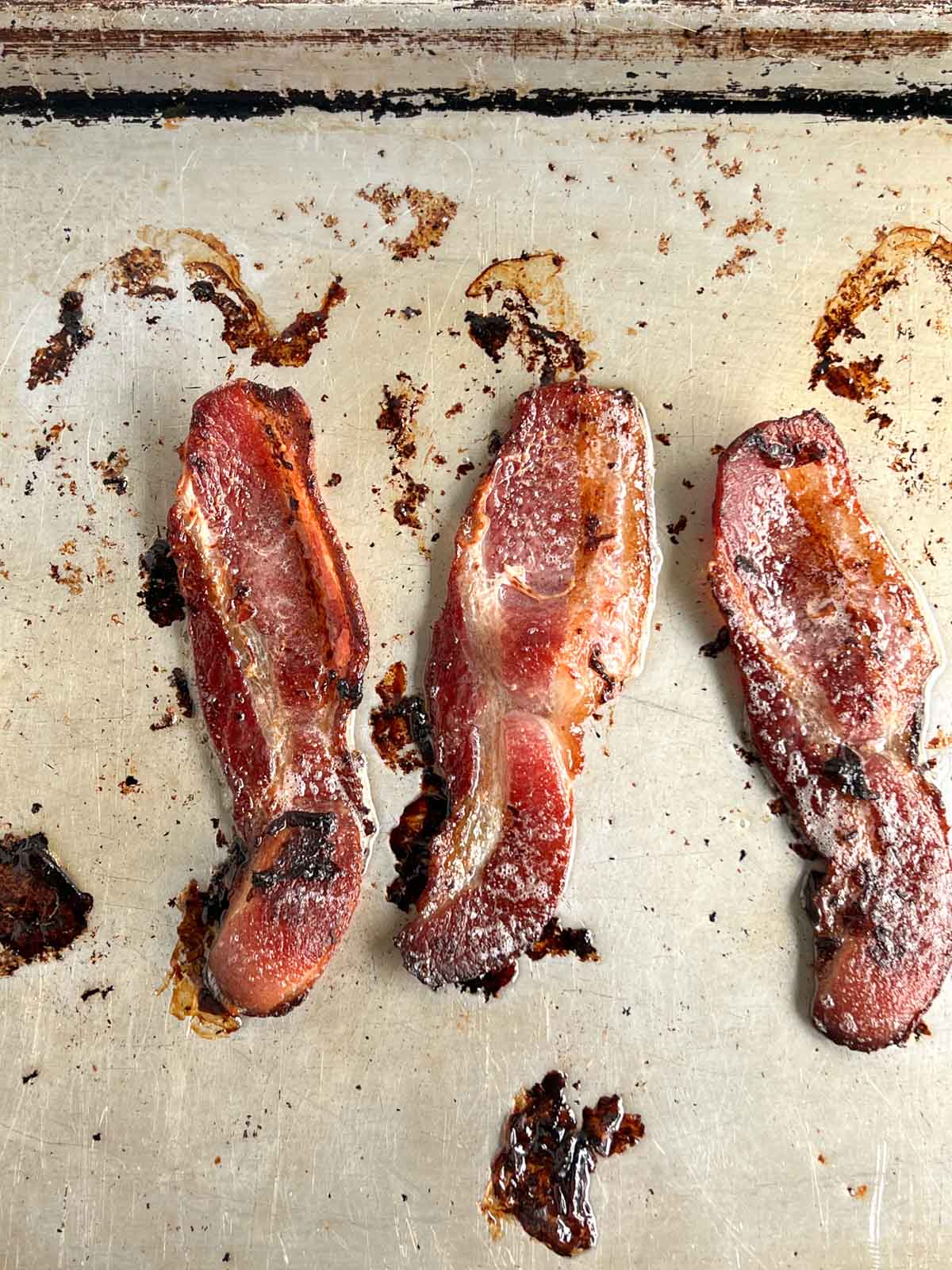 Cooked bacon on a sheet pan