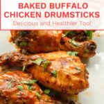 Baked Buffalo chicken drumsticks with celery sticks and baby carrots on a white plate