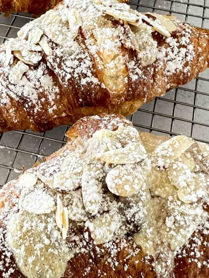 Almond Croissants on a wire cooling rack
